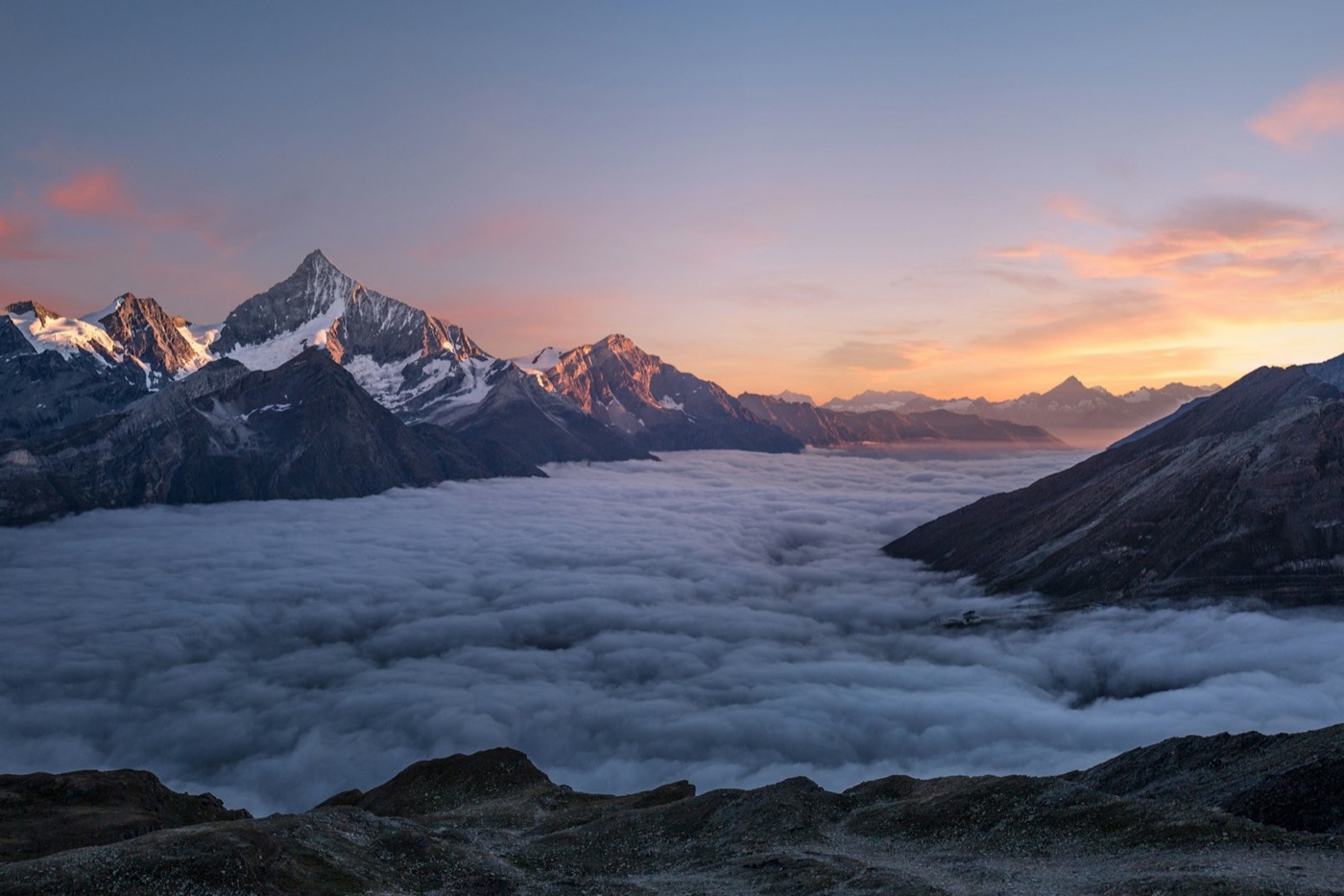 Mountains above a sea of cloud at dawn
